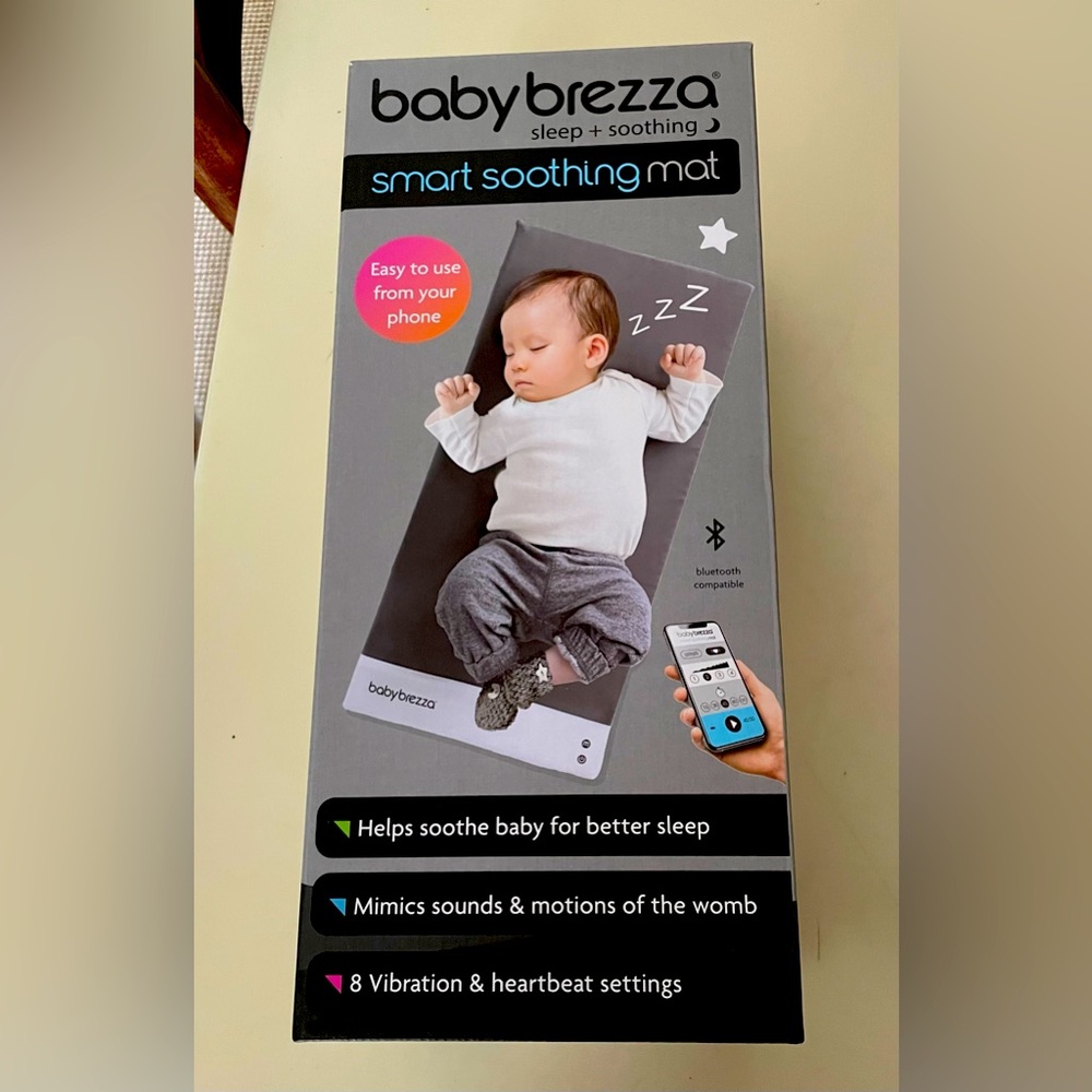 Baby Brezza soothing, vibrating, calming mat.